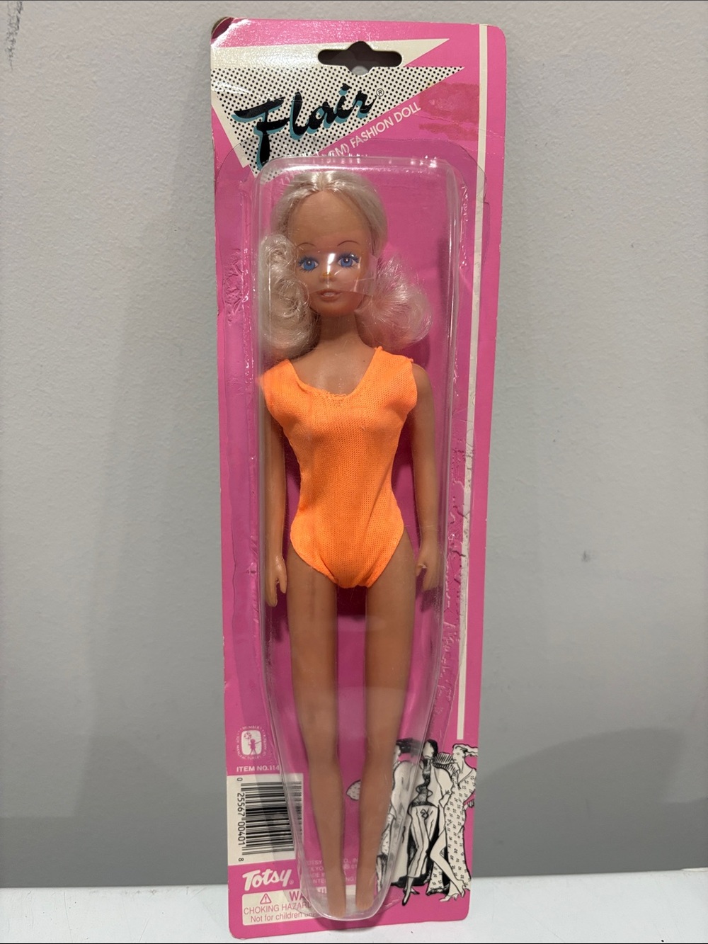 Vintage Totsy Flair Fashion Doll featuring blonde hair /a bright orange swimsuit